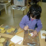 Finishing the medals and letting them sit to dry